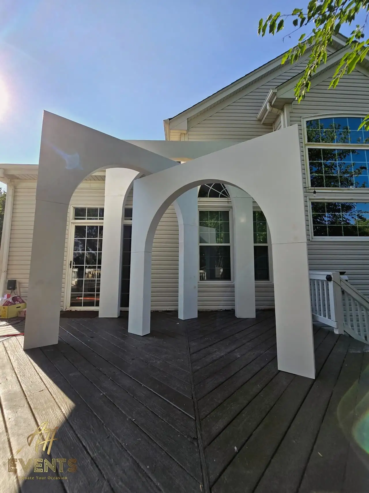 Volumetric Arc Suite — a custom sculptural backdrop built by AH Crafted.