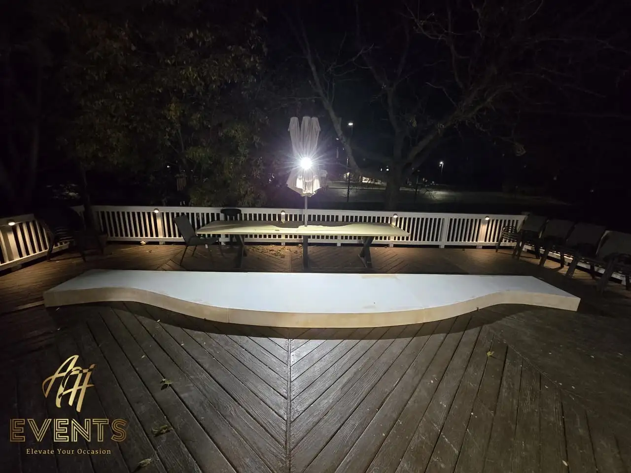 Classical Pillar Arch & Stage — a custom arch & contoured stage built by AH Crafted.