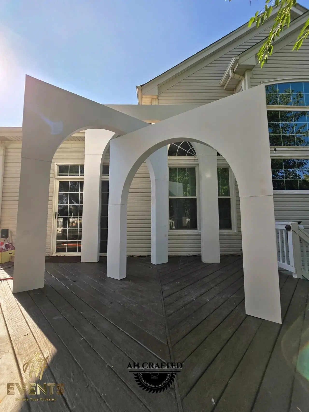 Volumetric Arc Suite — a custom sculptural backdrop built by AH Crafted.